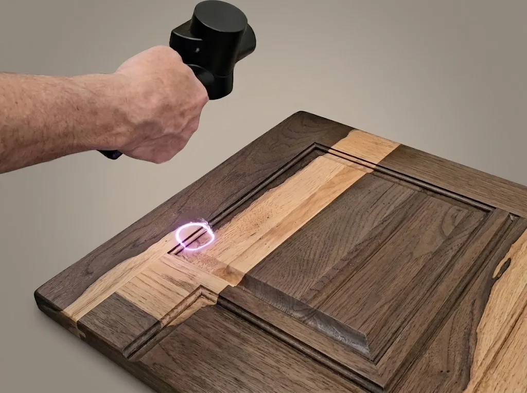 Low-power pulsed laser removing a surface layer with fine control
