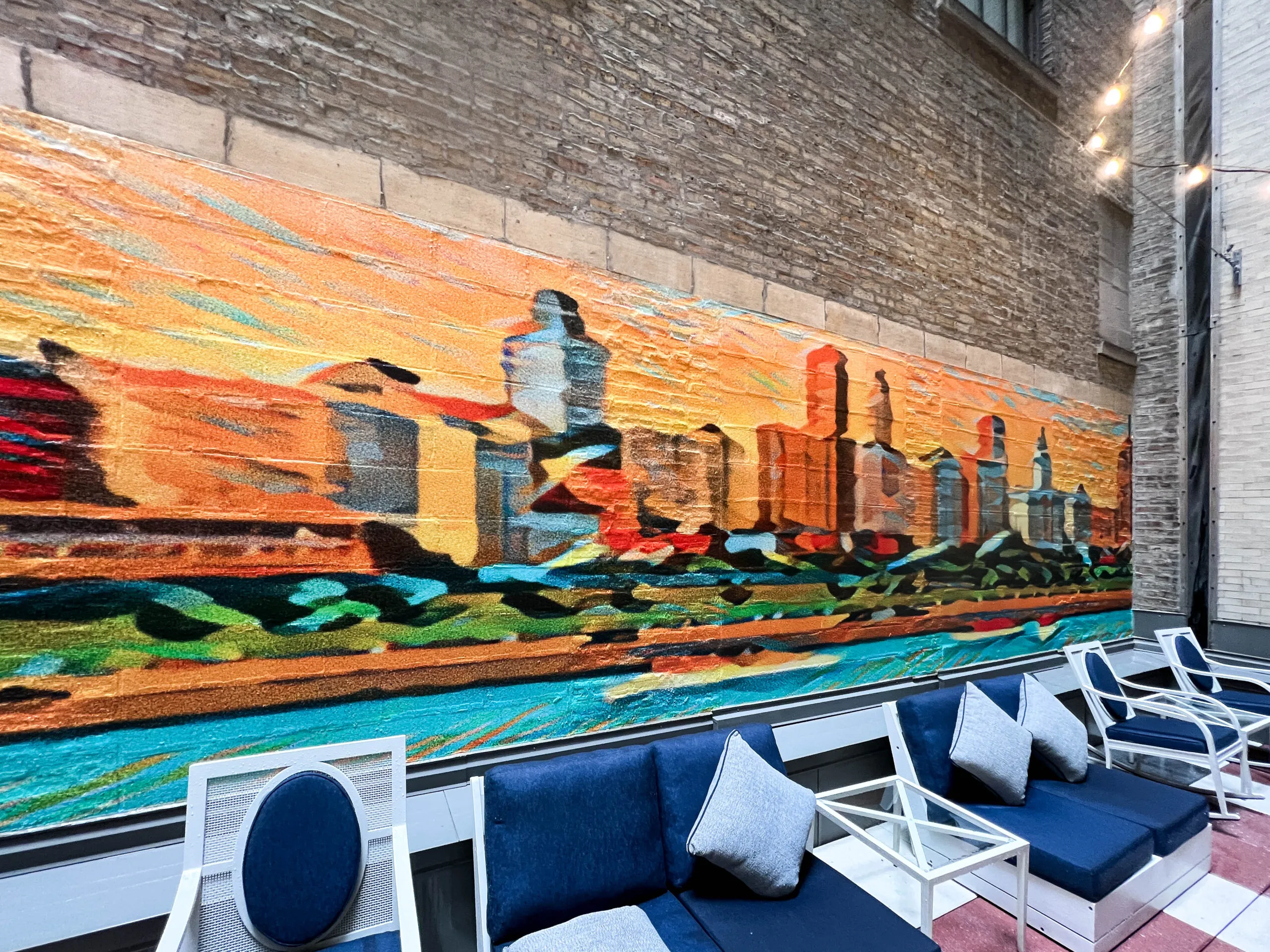 A printed feature wall in a hotel lobby