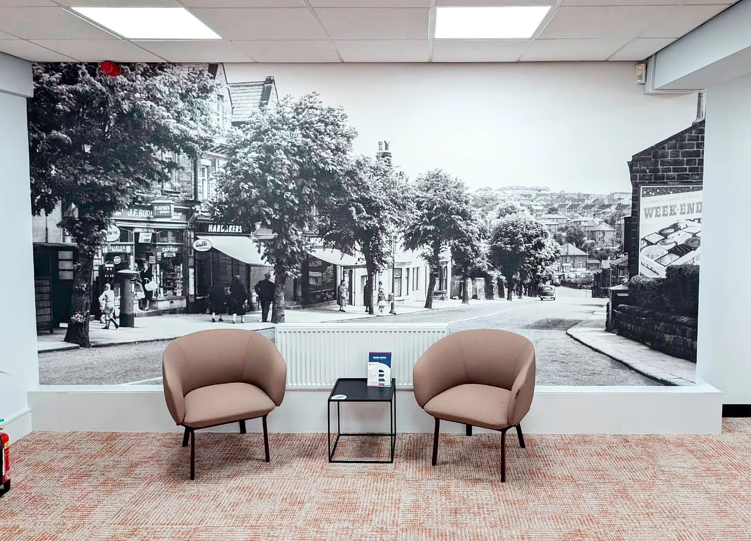 A printed graphic wall in a corporate meeting room